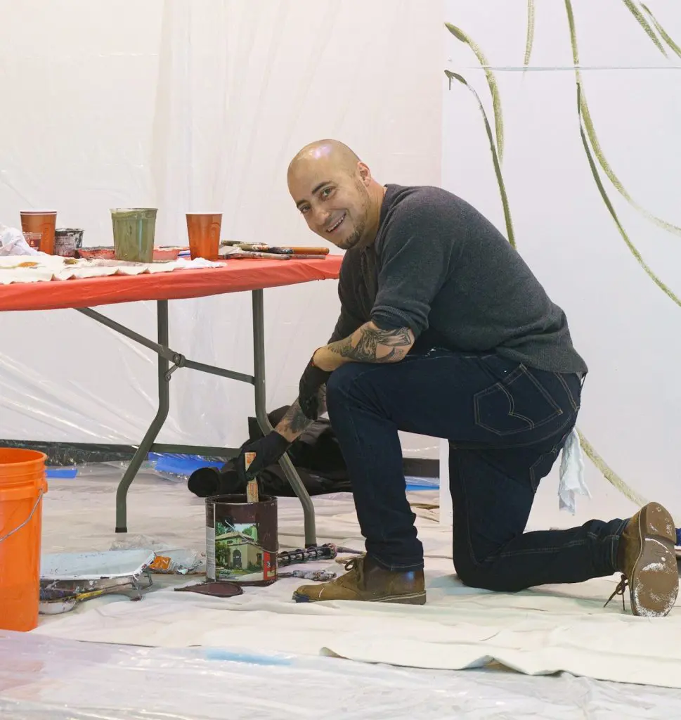Rodrigo Pradel stirring paint
