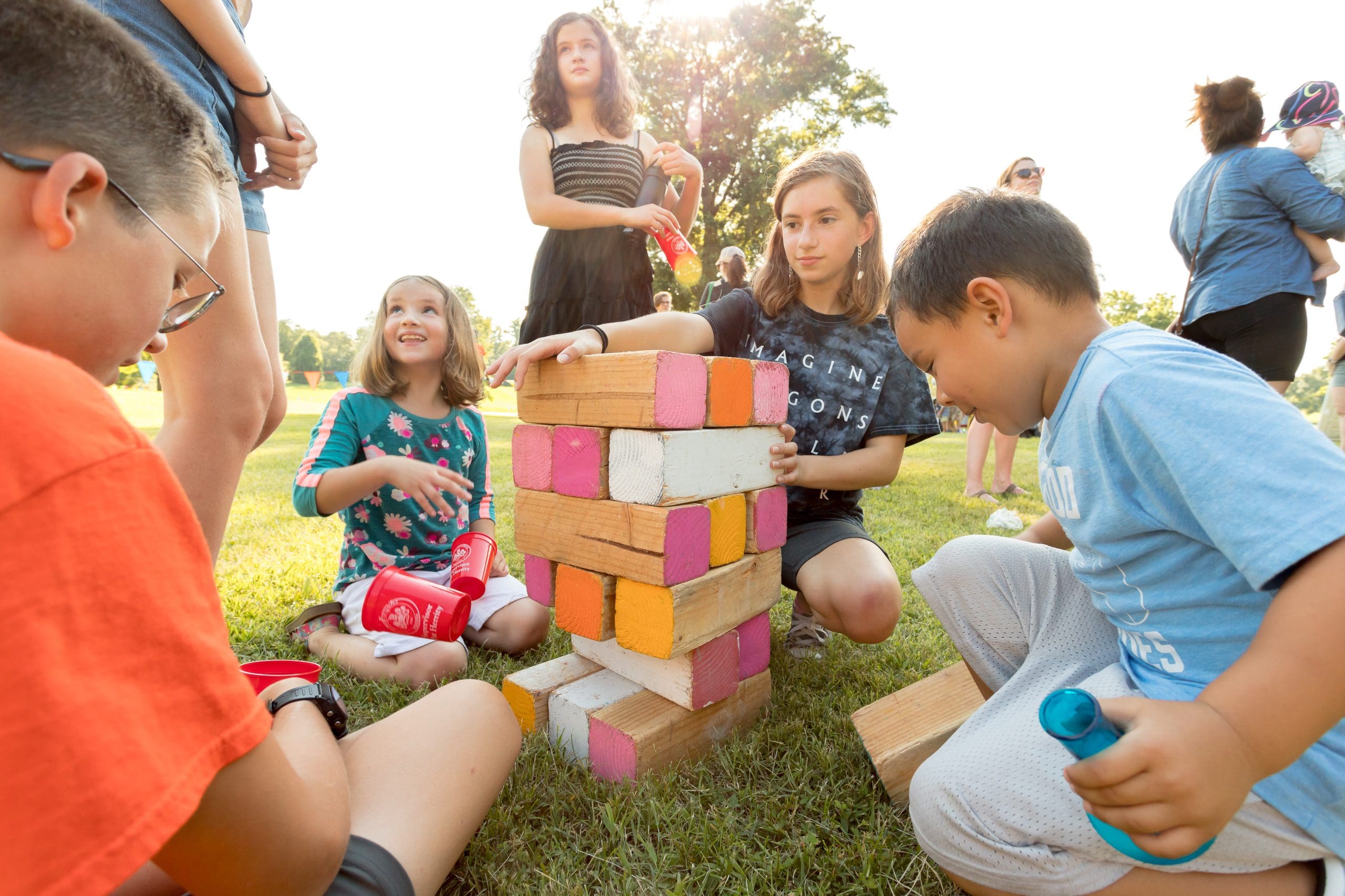 Picture of group of kids playing giant jenga