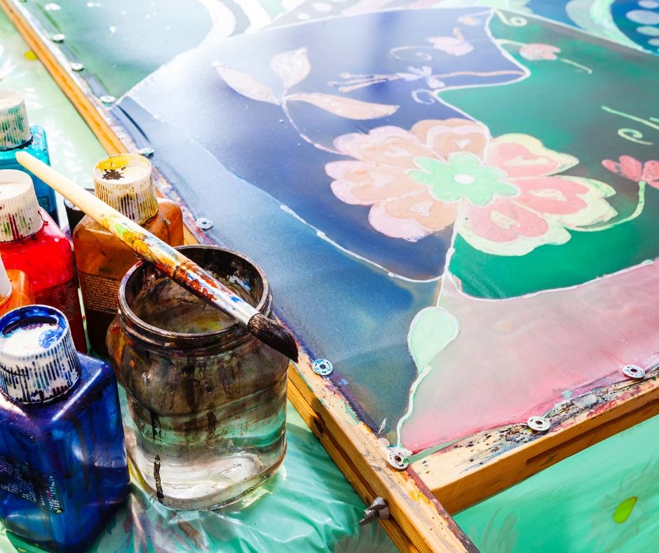 Painting and art supplies on a table